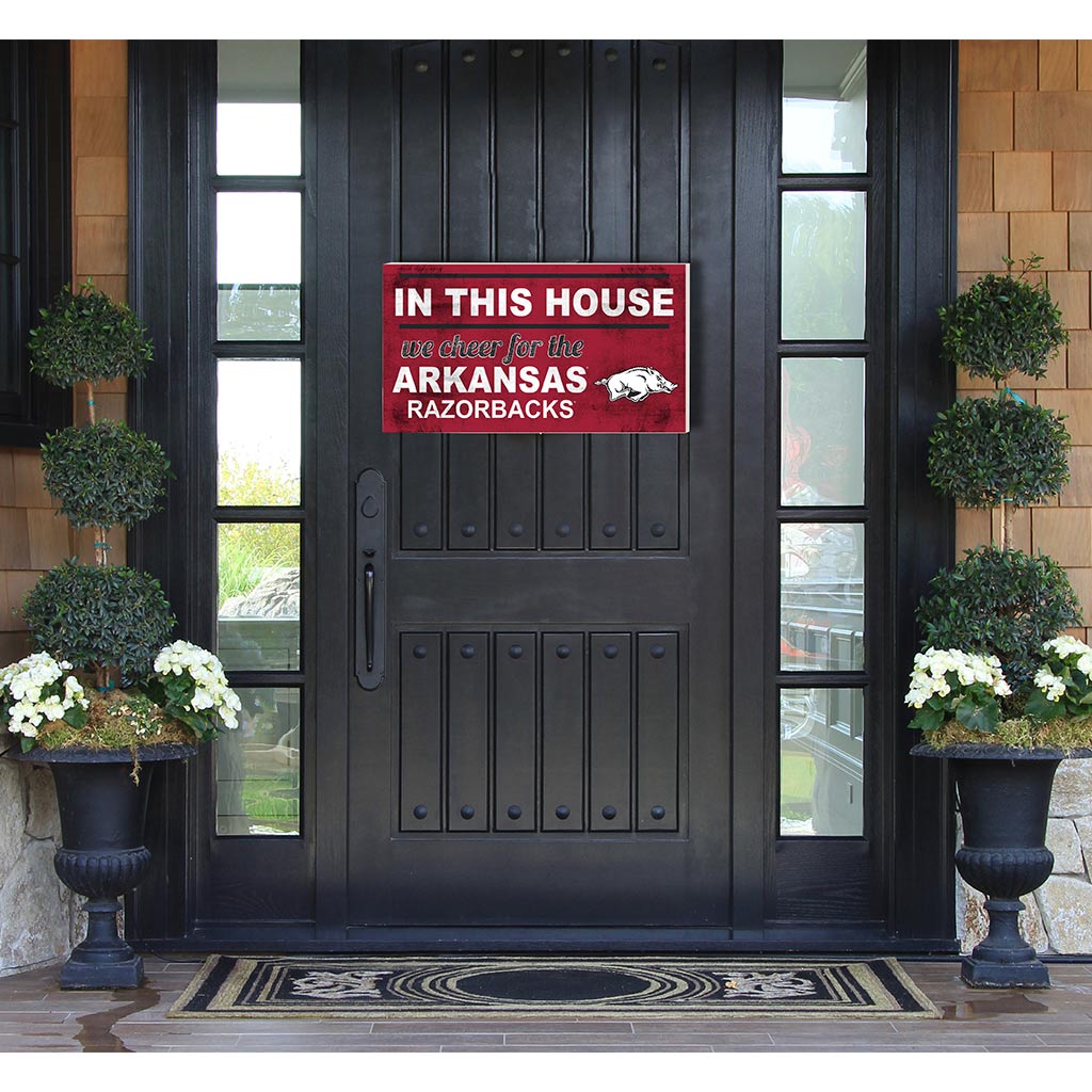 20x11 Indoor Outdoor Sign In This House Arkansas Razorbacks